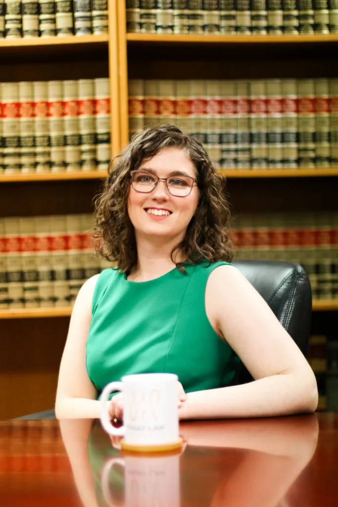 Lawyer sitting in front of law books