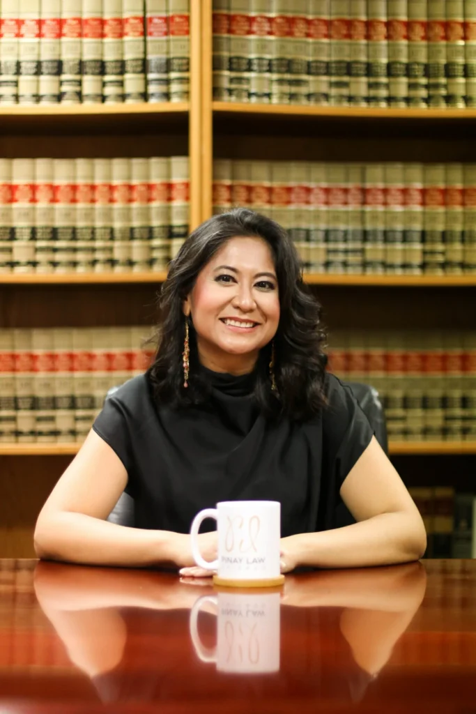 photo of lawyer in front of law books
