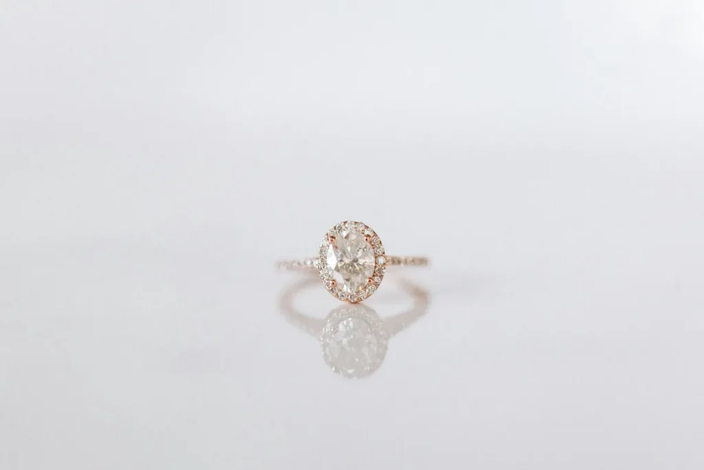 Oval diamond engagement ring with a rose gold setting, illustrating engagement ring ownership under Illinois law.